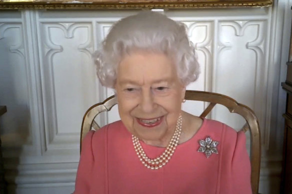 Queen Elizabeth on a video call with health officials, saying that when she was vaccinated “it didn’t hurt at all”. 