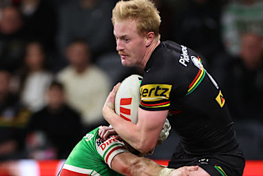 SYDNEY, AUSTRALIA - JULY 03: Thomas Jenkins of the Panthers is tackled during the round 18 NRL match between Penrith Panthers and South Sydney Rabbitohs at CommBank Stadium, on July 03, 2026, in Sydney, Australia. (Photo by Jeremy Ng/Getty Images)