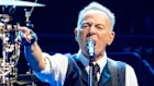 Bruce Springsteen criticised the Trump administration on the first night of his European tour in Manchester, England.