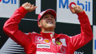 Schumacher celebrates his win in the French Grand Prix in 2004.