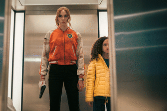 Karen Gillan and Chloe Colemann in Gunpowder Milkshake.