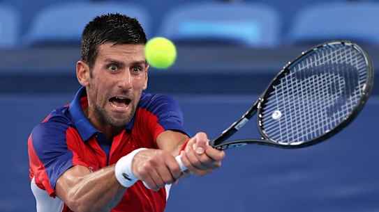 TOKYO, JAPAN - JULY 30: Novak Djokovic of Team Serbia plays a backhand during his Men's Singles Semifinal match against Alexander Zverev of Team Germany on day seven of the Tokyo 2020 Olympic Games at Ariake Tennis Park on July 30, 2021 in Tokyo, Japan. (Photo by Clive Brunskill/Getty Images)
