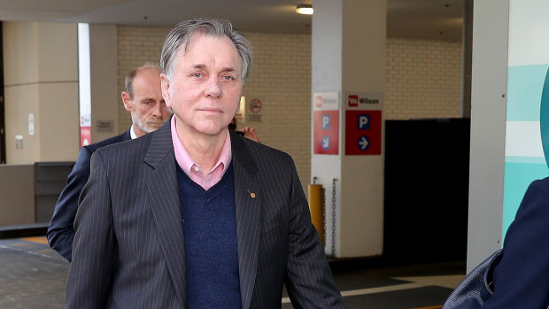 Nobel laureate Barry Marshall leaves the Perth Magistrates Court.