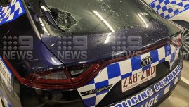 A police car damaged in the incident.