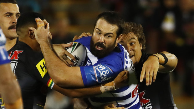 Working Dog: Canterbury prop Aaron Woods takes a hit-up on Friday night.