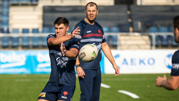 Former Wallabies coach Michael Cheika keeps a close eye on Roosters training in Barcelona.