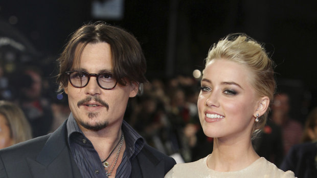 Before it all went bad: Johnny Depp and Amber Heard in 2011. 