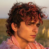 Lee (Timothee Chalamet) joins up with fellow “eater” Maren (Taylor Russell) in Bones and All.