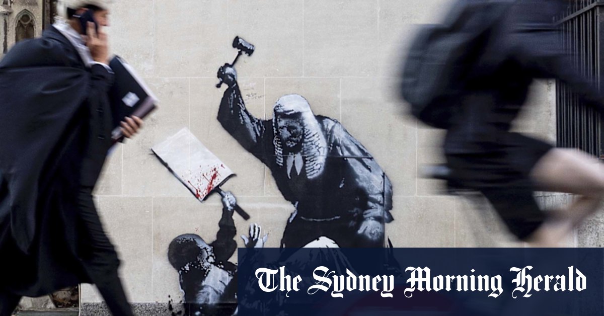 New artwork on London court wall depicts judge striking protester