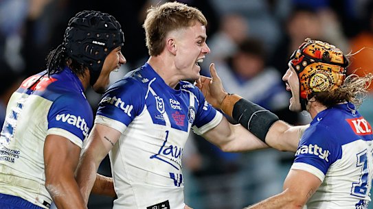 Lachlan Galvin celebrates after scoring a try on his Bulldogs debut. 