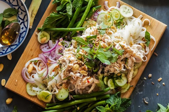 Serve this lemongrass, ginger and makrut lime poached chicken on a platter for everyone to help themselves.