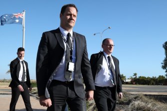 Detective Senior Sergeant Cameron Blaine, at front, with colleagues outside the Carnarvon Courthouse.