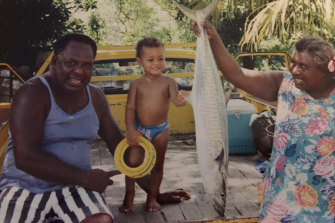 Mills as a toddler on Thursday Island with his grandparents Sammy and Salome. 