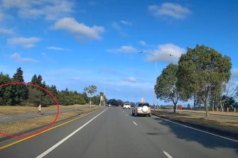 Dashcam footage screenshots from Foxwell Road in Coomera where two children nearly ran out in front of traffic on October 22.