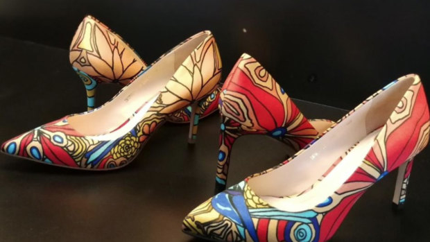 Jimmy Choo shoes with Peter  Farmer's Aboriginal artwork.