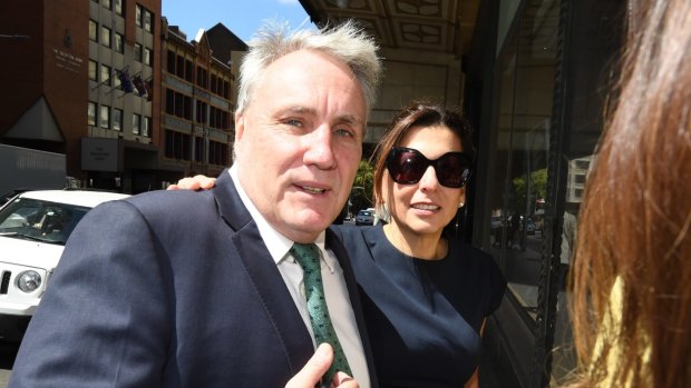 Michael Cranston and his wife, Gloria, after he was found not guilty of misusing his position to help his son.