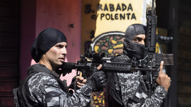 Police conduct an operation against alleged drug traffickers in the Jacarezinho favela of Rio de Janeiro, Brazil, on Thrusday.
