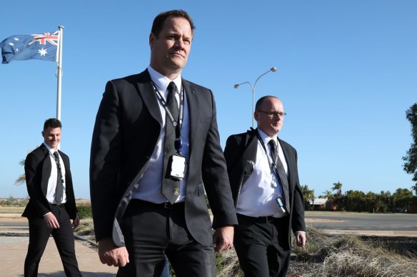 Detective Senior Sergeant Cameron Blaine, at front, with colleagues outside the Carnarvon Courthouse.