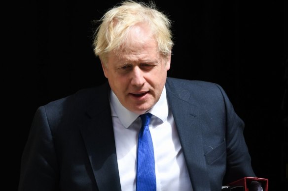 British Prime Minister Boris Johnson leaves 10 Downing Street to attend a questions and answers session in parliament on Wednesday.