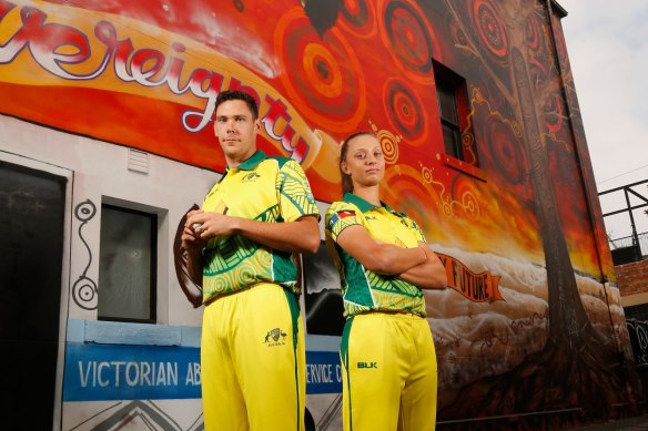 Indigenous cricketers Scott Boland and Ash Gardner pose for a photo in 2018.