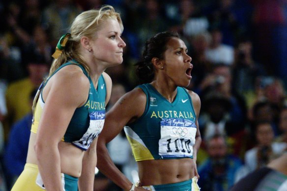 Melinda Gainsford-Taylor and Cathy Freeman after the final of the women’s 200m event at the Sydney 2000 Olympics.