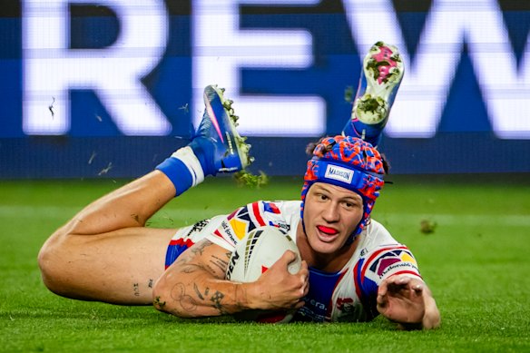 Kalyn Ponga scores for Newcastle.