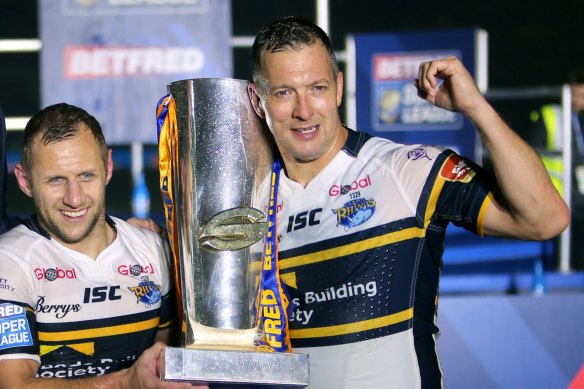 Rob Burrow (left) finished his playing career on a high, winning the 2017 Super League grand final with Leeds.
