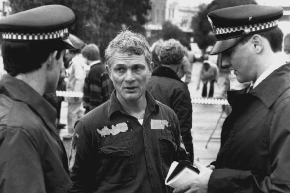 Lucky escape … Mr Peter Horeau speaks to police after the incident.