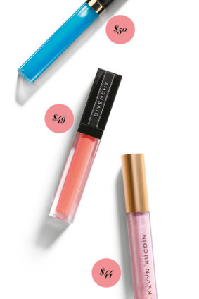 Chanel Rouge Coco Gloss
in Aphrodite, $50.
Givenchy Gloss Interdit Vinyl in Corail Graffiti, $49. Kevyn Aucoin gloss in
Pink Crystal, $44.