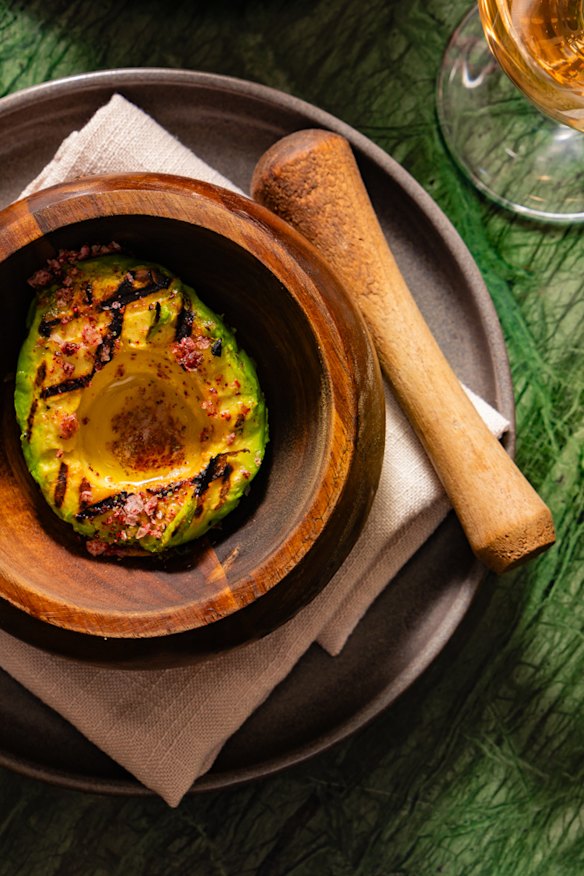Ember-cooked avocado with native citrus salt. 
