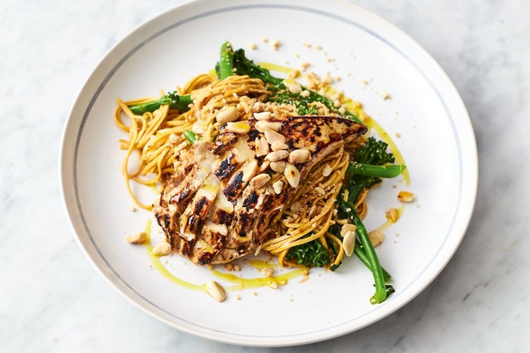 Jamie Oliver's chicken noodle stir-fry with broccolini and toasted peanutsJamie: Keep Cooking And Carry On, Fridays 7:30pm only on 10.ÃÂ©2019 Jamie Oliver Enterprises Ltd,Photographer David LoftusSingle online use for Goodfood.com.au, do not use after 6 months