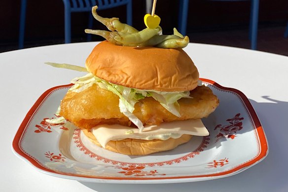 Pickled green chillies crown the top of Beautiful Jim Key's fish burger.
