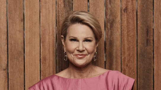 Julia Morris loves mixing a red carpet gown with a pair of sneakers.