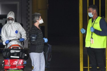 A guest and staff at Rydges Hotel in Carlton in April.