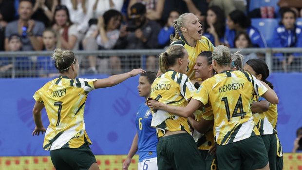 Australia's players celebrate after Chloe Logarzo scored their side's second goal.