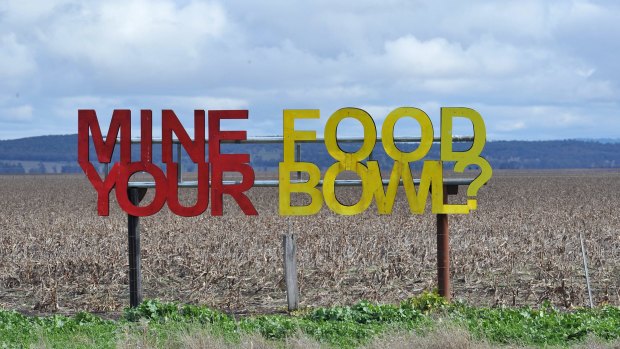 A sign erected by a landholder on the Liverpool Plains, where farmers are calling for NSW government to cancel Shenhua's proposed coal mine. 