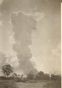 Smoke cloud rises over Katherine after the raid.