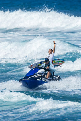 Victory: Fitzgibbons on her way into shore.