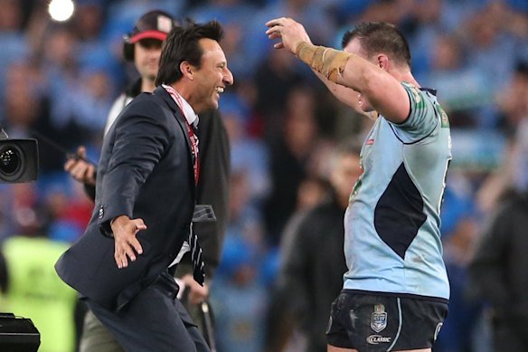 Laurie Daley and Paul Gallen celebrate a memorable, and rare, win over Queensland in 2014.