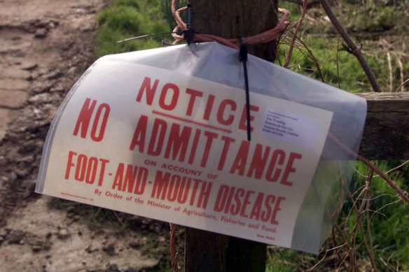 A sign warns against foot and mouth disease at a British farm. 