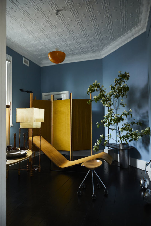A floor lamp by Lana Launay and room screen by Fold Studio in the “blue room”, painted Post Boy Blues by Dulux.