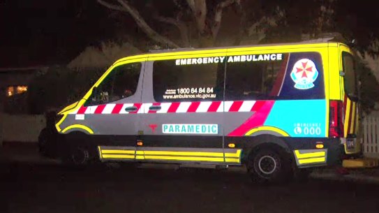An ambulance at a Northcote house in August, where a woman is believed to have died with COVID-19.
