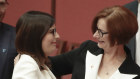 Senator Marielle Smith is congratulated by former Prime Minister Julia Gillard after her maiden speech. 