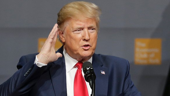 Who's listening to the bad news ... US President Donald Trump this week. 