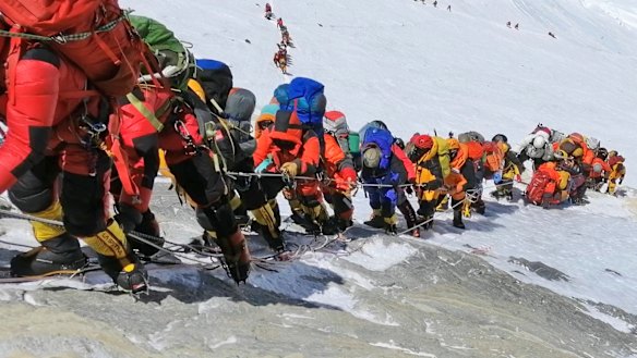 A queue of climbers line a path on Mount Everest this year.
