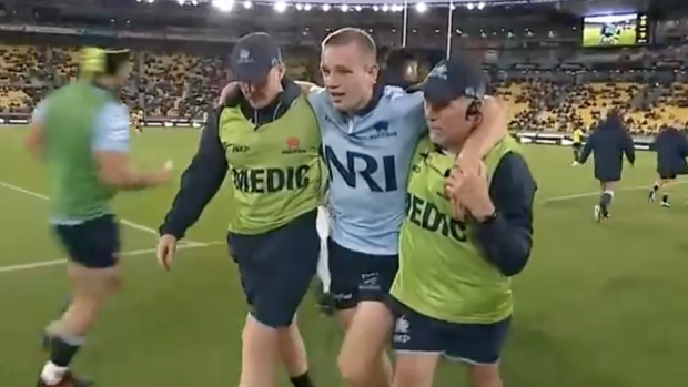 Max Jorgensen leaves the field after being injured against the Hurricanes.