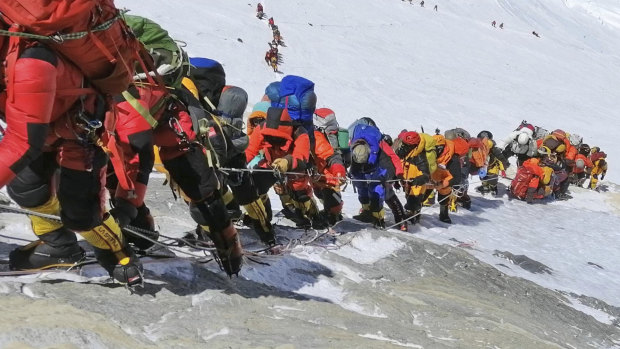 A queue of climbers line a path on Mount Everest this year.
