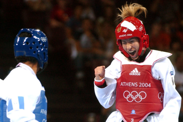 Carolyn Anderson (then Bartasek) celebrates at the 2004 Athens Olympics.