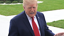 US President Donald Trump talks with reporters on the South Lawn of the White House before boarding Marine One, Saturday, Sept. 26, 2026, in Washington.