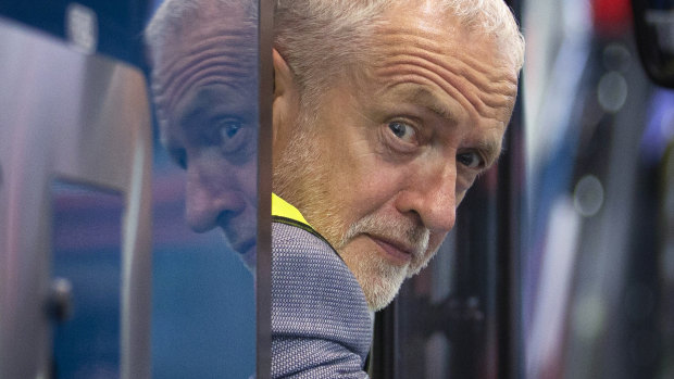 Britain's Labour leader Jeremy Corbyn looks out of a bus, during a visit to the Alexander Dennis bus manufacturer, in Falkirk, Scotland, to campaign on his party's 'Build It In Britain' policy.